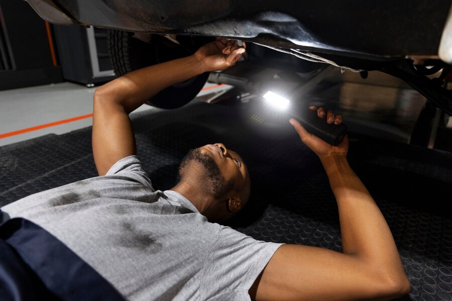 car-being-taking-care Bright LED headlight on polished blue car